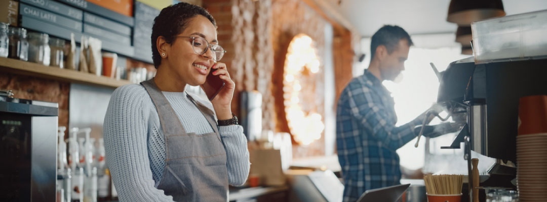 Business owner speaking on the phone. 